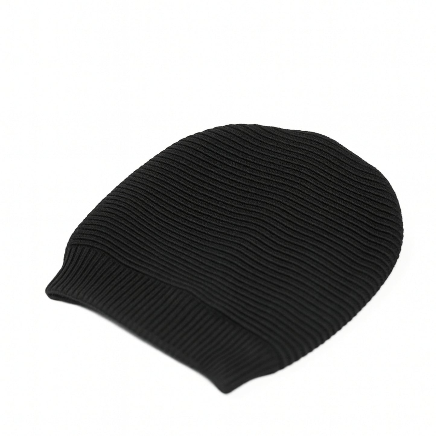 Black knitted beanie with woolen inner photographed on a white background