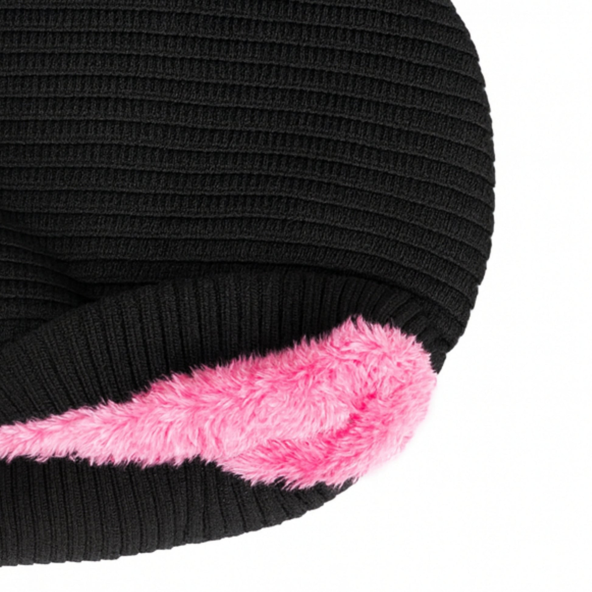 Black knitted beanie with woolen inner photographed on a white background