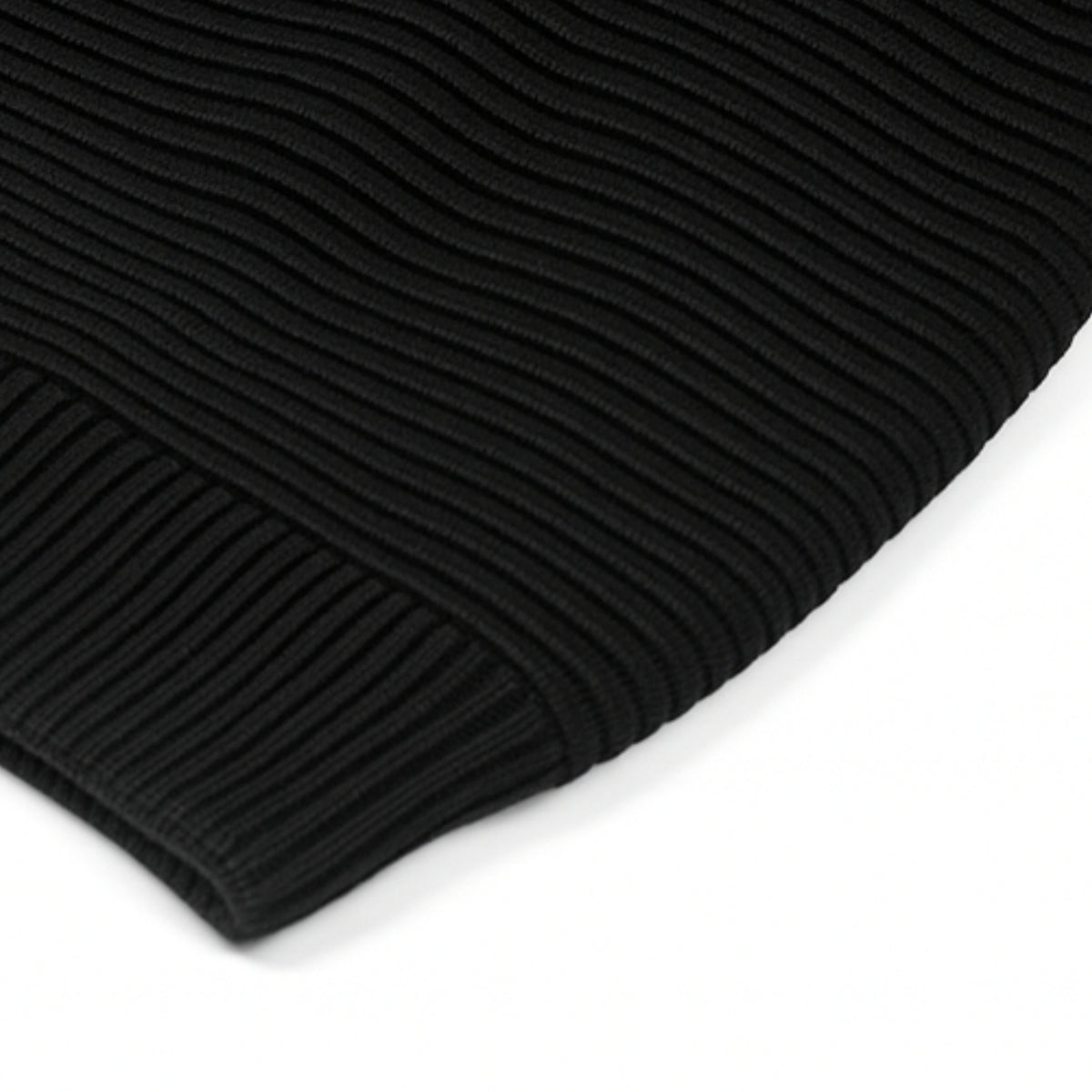 Black knitted beanie with woolen inner photographed on a white background