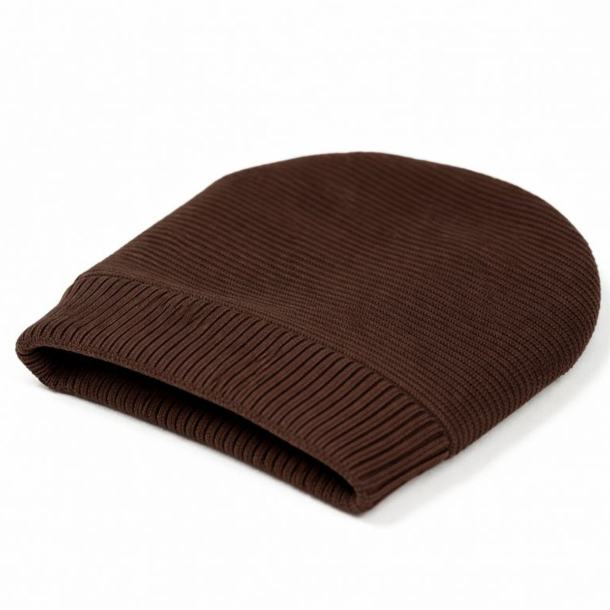 Brown knit beanie with woolen inner on a white background