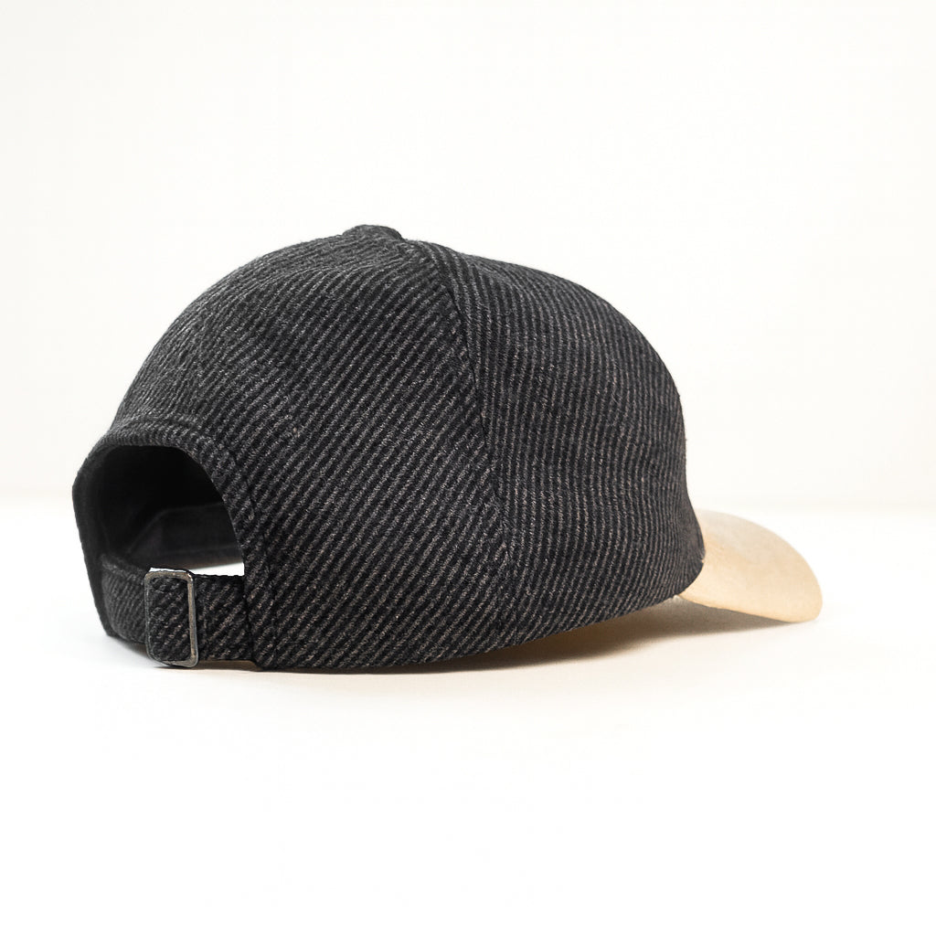 Black cap with a wooden visor on a white background