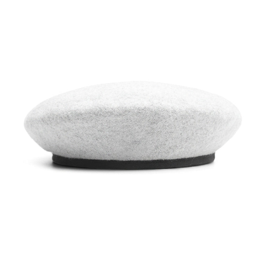 A light gray felt beret-style hat with a black base, photographed against a solid white background.
