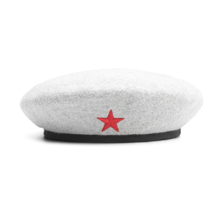 A light gray felt beret-style hat with a small red embroidered star on the front and a black band around the base, shown on a plain white background.