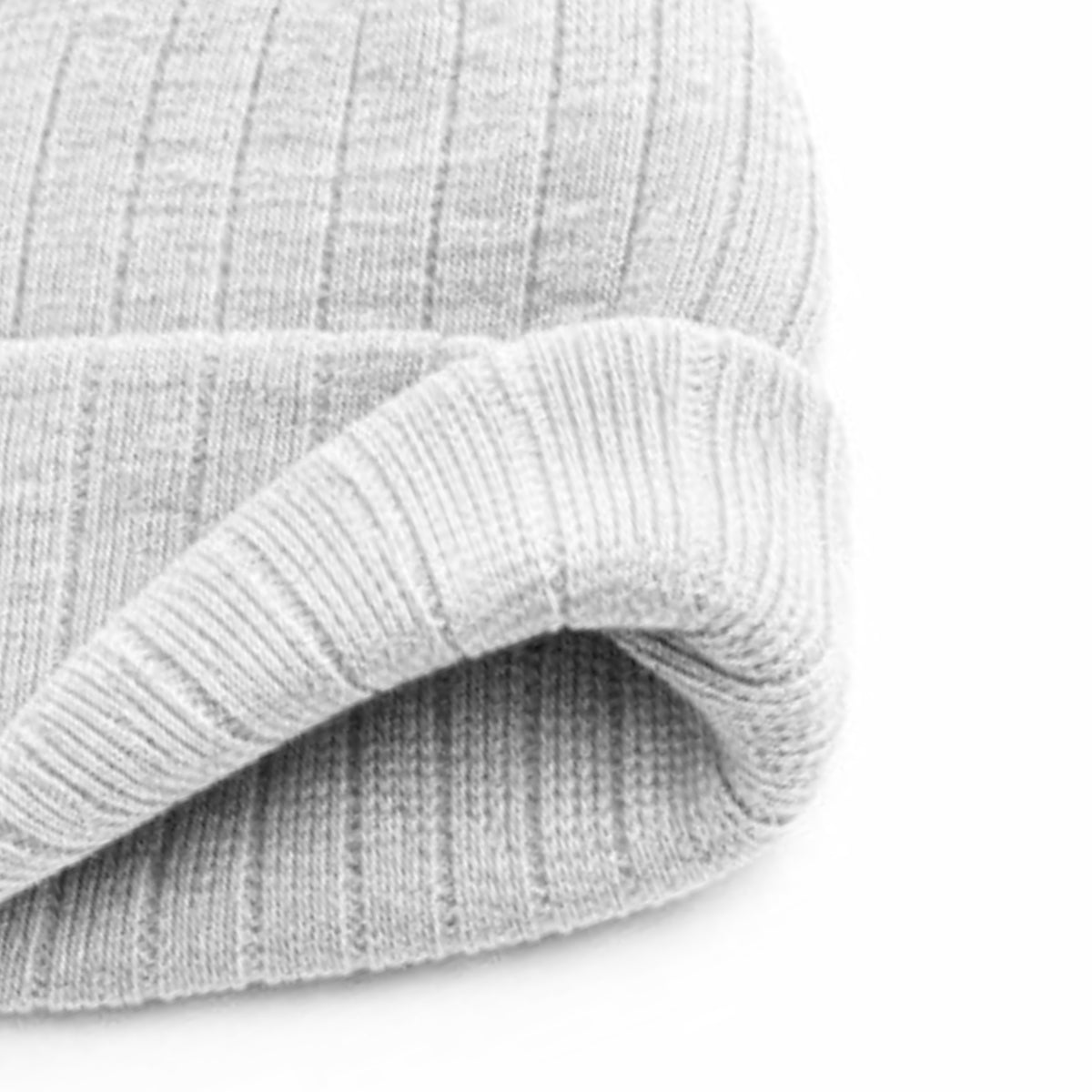 Close-up of a gray knit beanie on a white background
