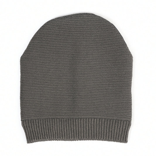 Gray knit beanie with woolen inner on a white background