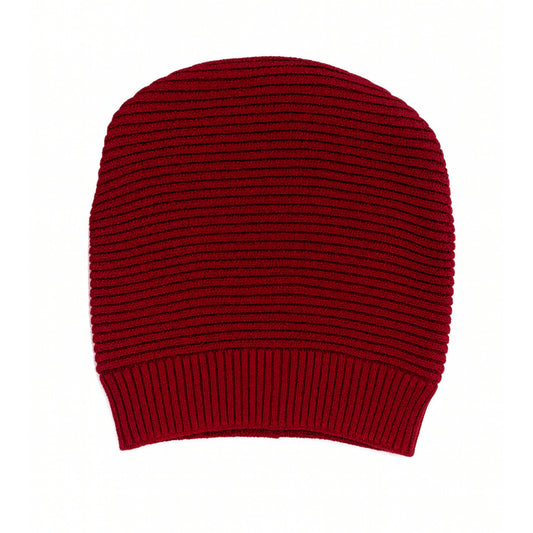 Red knit beanie with woolen inner photographed on a white background