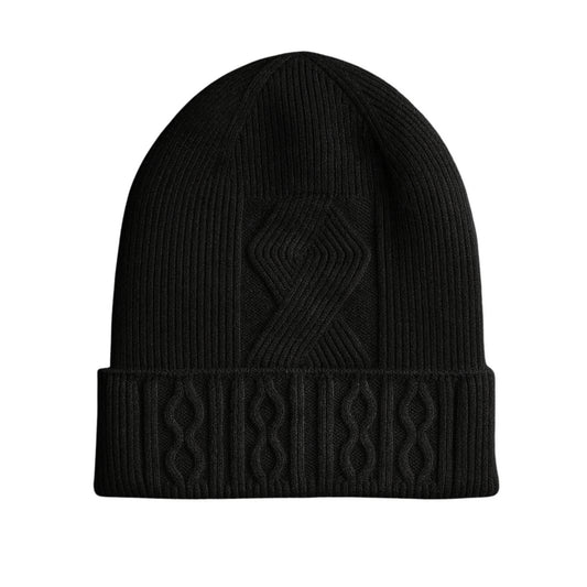 Black knit woolen beanie with cable pattern and velvet inner photographed on a white background