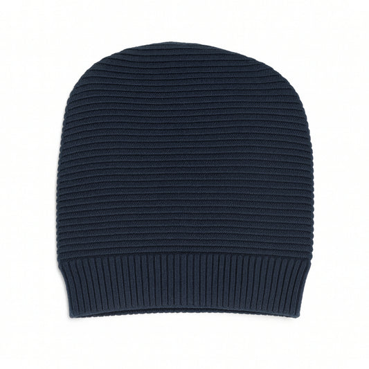 navy blue knit beanie with woolen inner pictured on a white background
