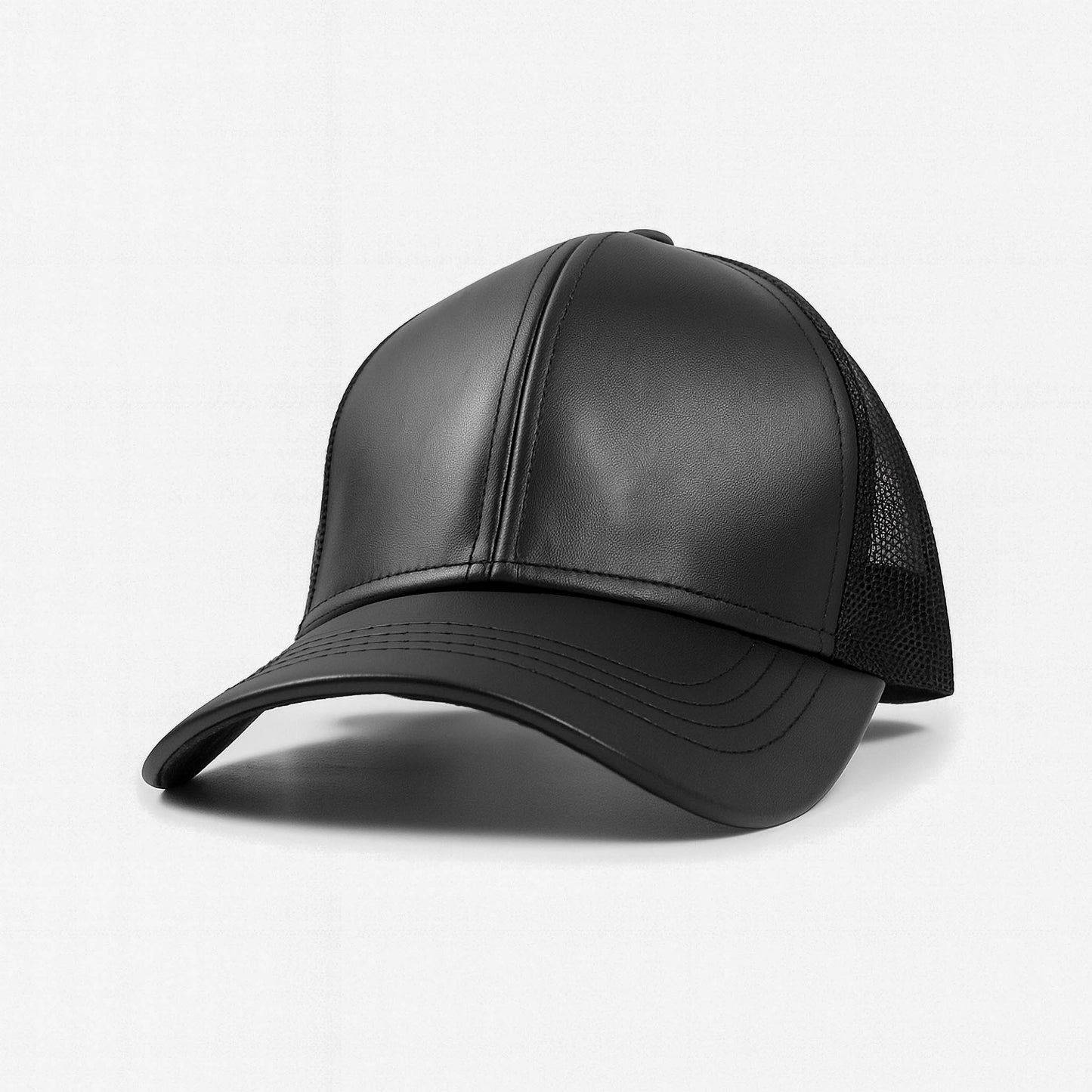 Black faux leather baseball cap with a mesh back,structured high crown , stiched curved brim and an adjustable snapback strap photographed on a white background.
