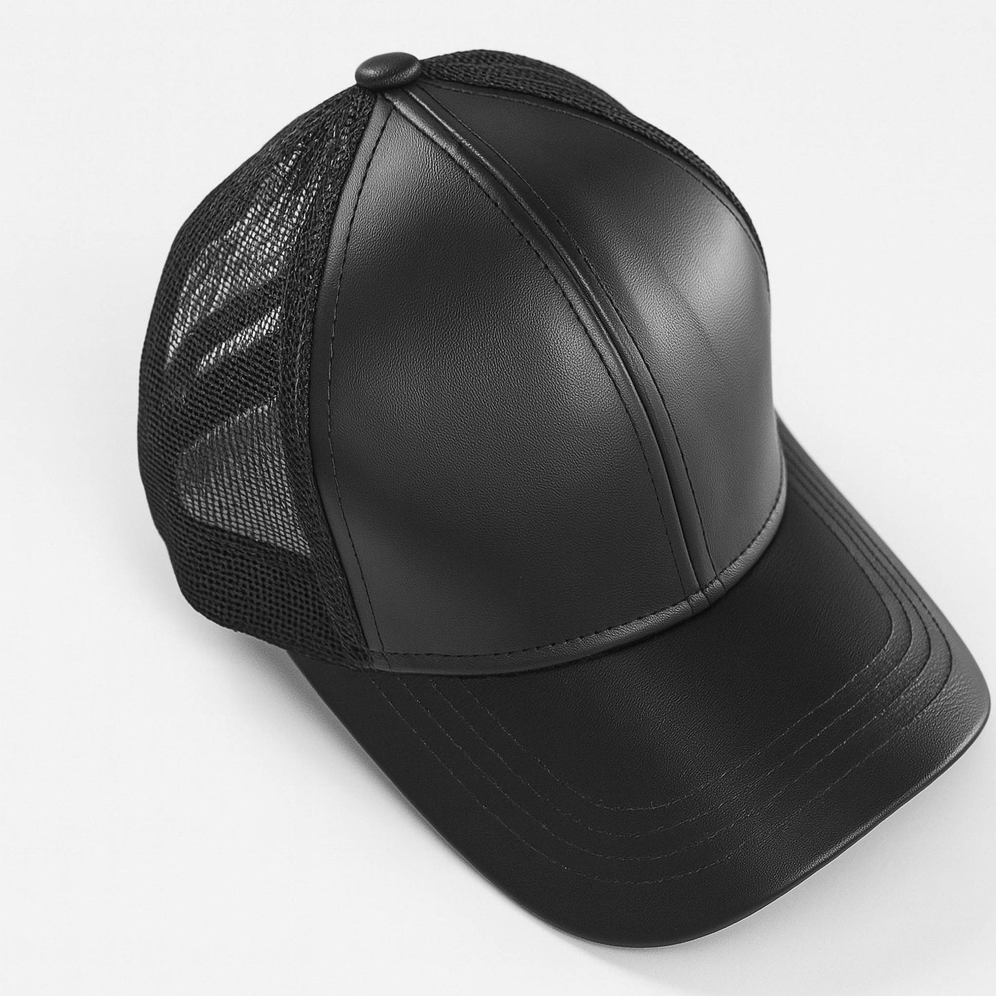 Black faux leather baseball cap with a mesh back,structured high crown , stiched curved brim and an adjustable snapback strap photographed on a white background.
