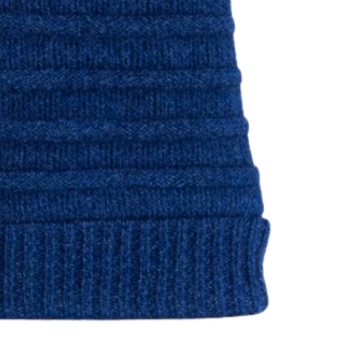 Blue knitted beanie with polyster inner photographed on a white background