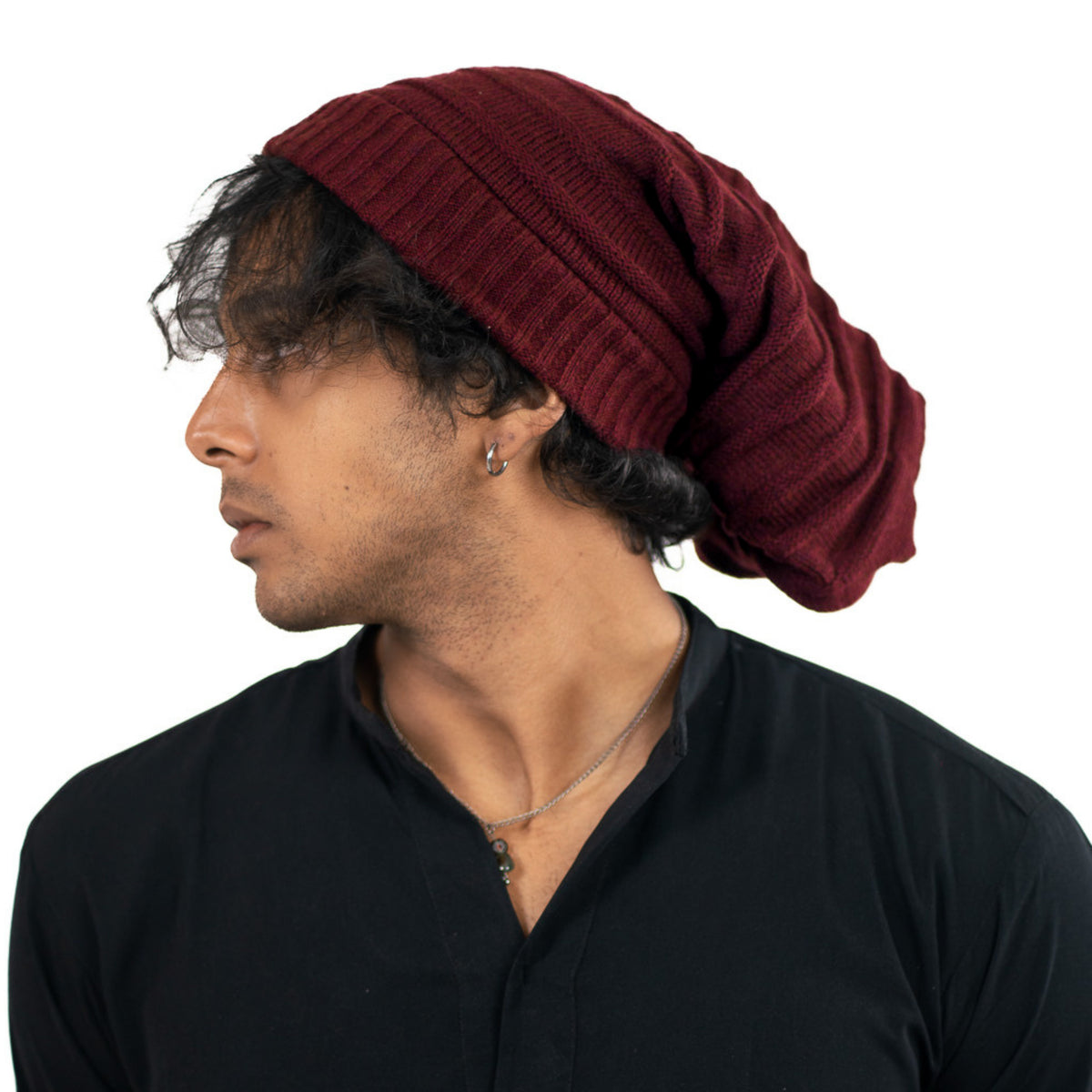 Maroon ribbed knit beanie with polyster inner photographed on a white background