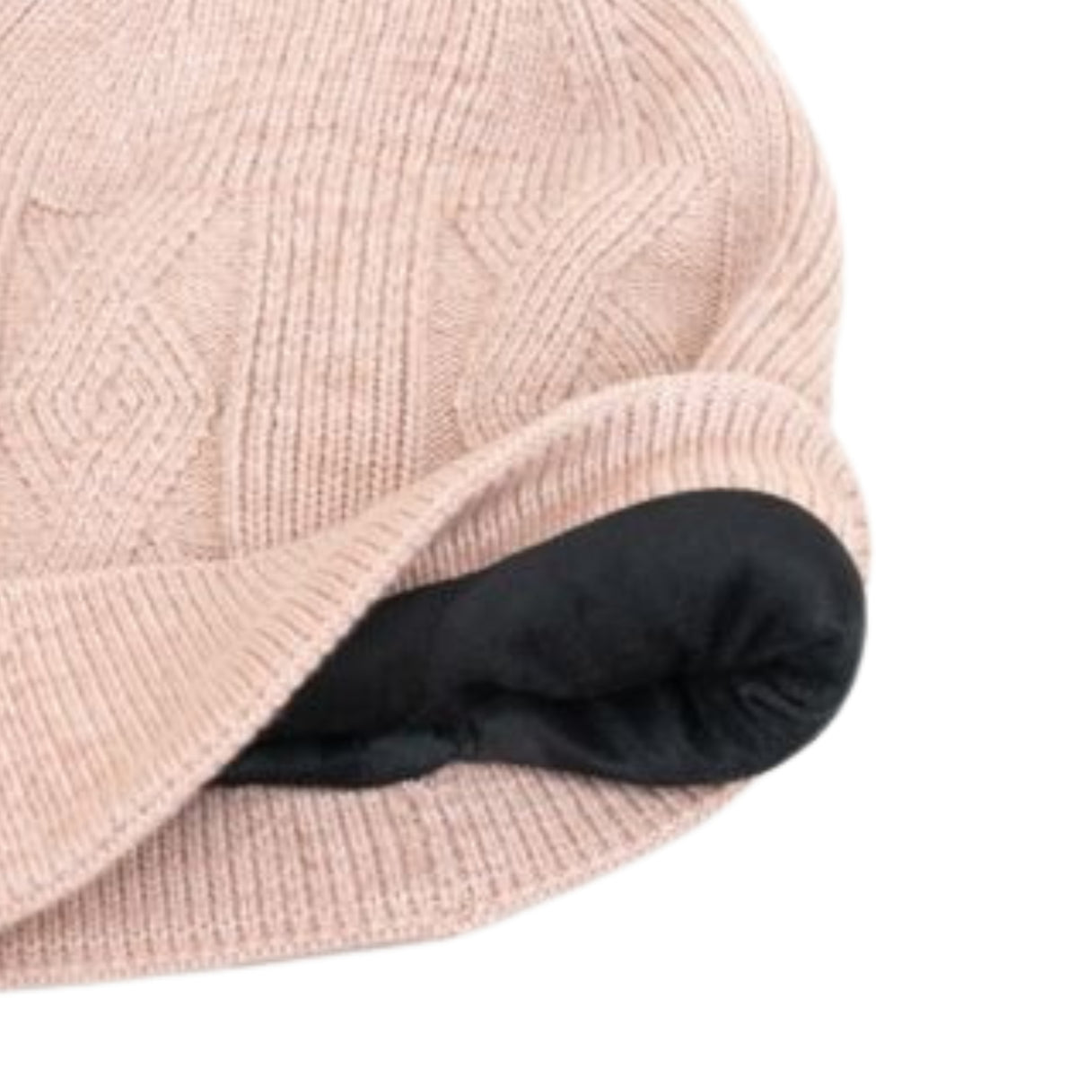 Off white knit beanie with velvet inner photographed on a white background