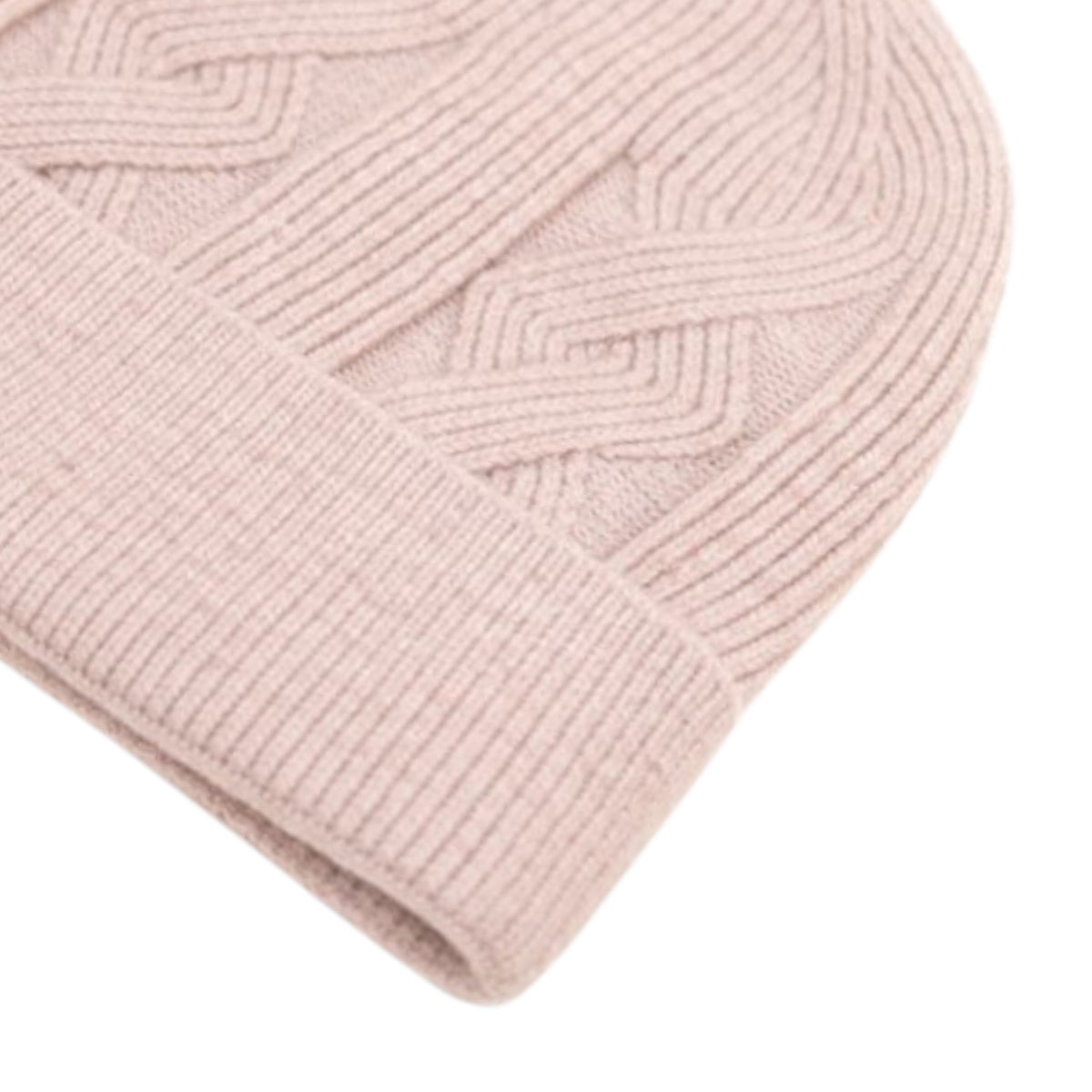 Off white knit beanie with velvet inner photographed on a white background