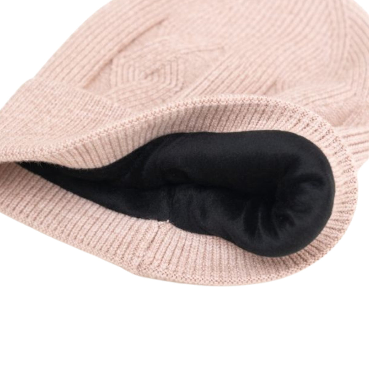 Off white knit beanie with velvet inner photographed on a white background