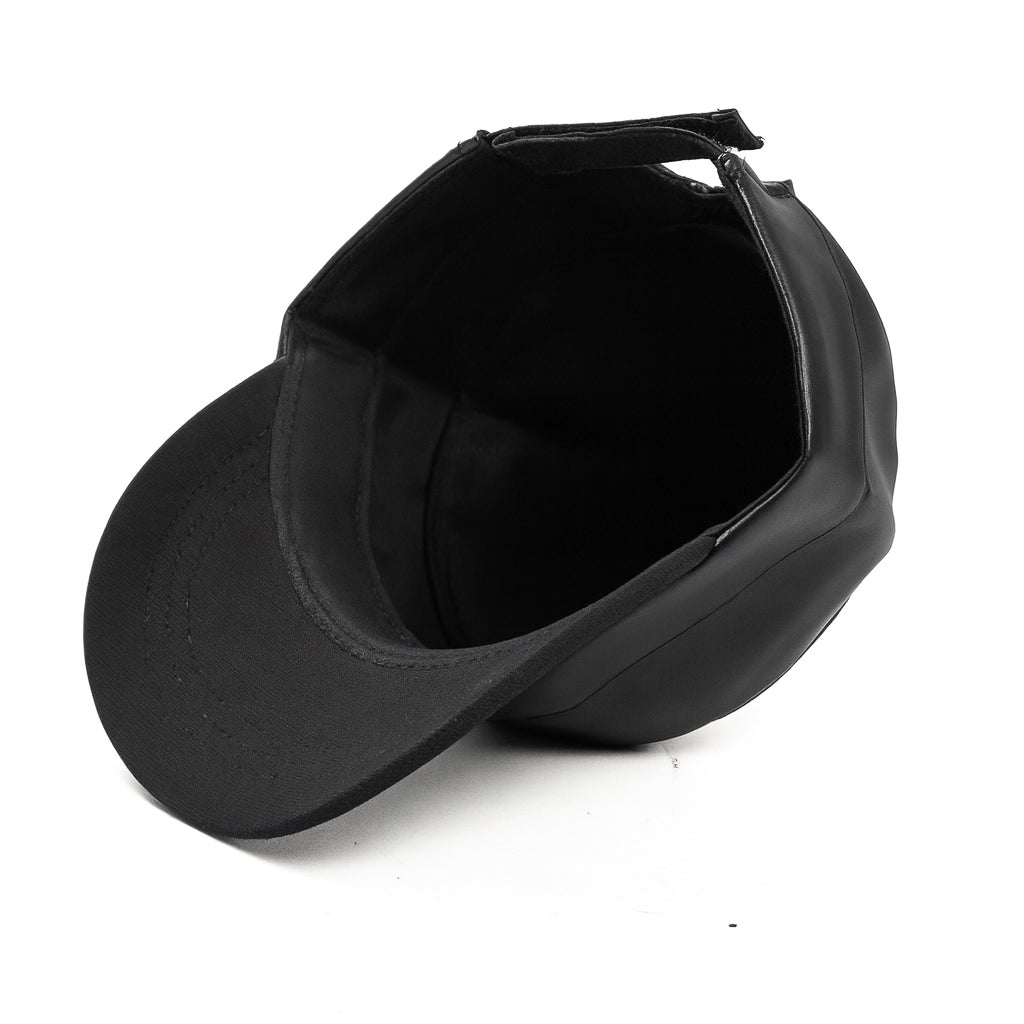 Premium black faux leather military cap by No Cap with a smooth matte finish and stitched curved brim with adjustable back strap displayed on a white background.