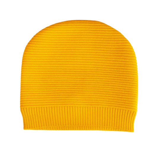 Yellow knit beanie with woolen inner photographed on a white background